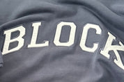 Navy volleyball sweatshirt with 'BLOCK' printed on it