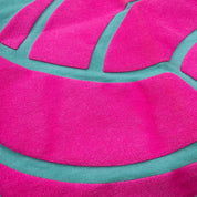 Pink volleyball puff print on teal volleyball t-shirt